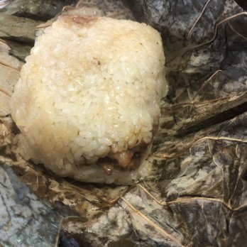 Tim Ho Wan - Sticky rice in Lotus Leaf. It has some pork/chicken Minced in between. - Dim Sum Near Me - Honolulu, Hawaii