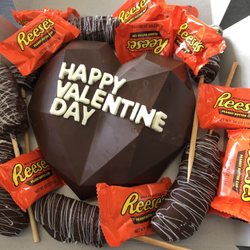 Zoey's Kickin Cakes - Chocolate heart with Reese's and Chocolate covered frozen bananas! YUM!