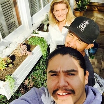 Dirt Beauty - a man and a woman taking a selfie - Landscaping Near Me