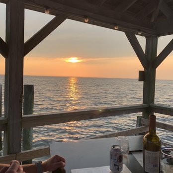 NC Coast Grill & Bar - Beautiful sunset over the sound - New American Near Me - Kitty Hawk, North Carolina NC Coast Grill & Bar - Beautiful sunset over the sound - New American Near Me - Kitty Hawk, North Carolina