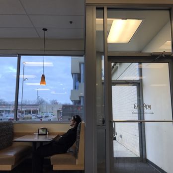 Hy-Vee Casual Dining - a woman sitting at a table - Breakfast & Brunch Near Me - Ames, Iowa