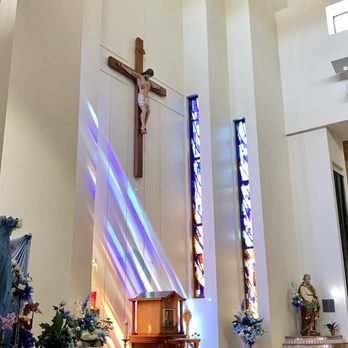 Immaculate Conception Catholic Church - Image of the Holy Spirit as a dove in the circular stained glass above Jesus - Churches Near Me - Sparks, Nevada Immaculate Conception Catholic Church - Image of the Holy Spirit as a dove in the circular stained glass above Jesus - Churches Near Me - Sparks, Nevada