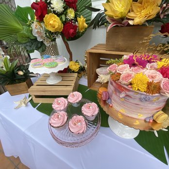 Minis by Mara - a cake and cupcakes on a table - Desserts Near Me Minis by Mara - a cake and cupcakes on a table - Desserts Near Me