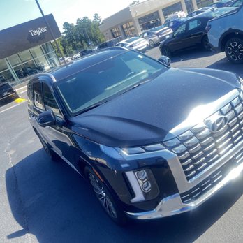 Taylor Hyundai - Moonlight exterior Hyundai Palisade Calligraphy AWD w/black interior front grill view. - Car Dealers Near Me - Augusta, Georgia