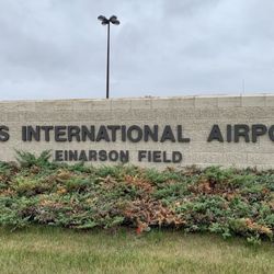 Falls International Airport - The entrance sign for Falls Int'l Airport.