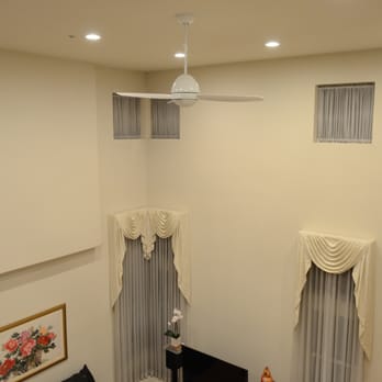 Formosa Electric - 8 recessed light on in the evening in high ceiling living room - Electricians Near Me - Newark, California