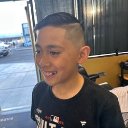 Black & Gold Barber Lounge - Barber Ryan did a great job with my son's haircut!