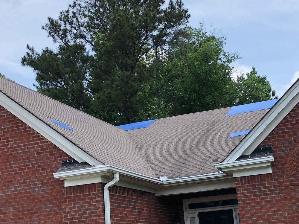 Slide of ER Roofing Specialist