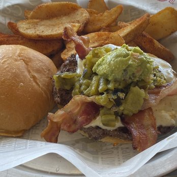 Fuddruckers - This is the 1/2lb southwest burger with green chile. - Burgers Near Me - Albuquerque, New Mexico Fuddruckers - This is the 1/2lb southwest burger with green chile. - Burgers Near Me - Albuquerque, New Mexico