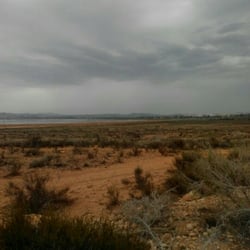 Via Verde - View to Salina de Torrevieja on a cloudy day. Via Verde de Torrevieja, Spain