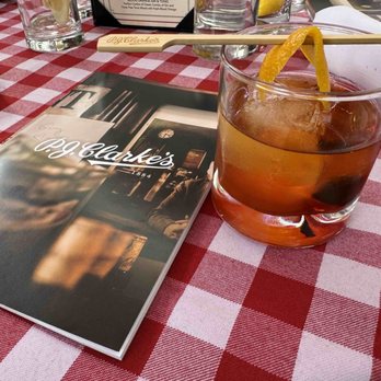 P. J. Clarke's - Smoky old fashioned with their 140 year celebration booklet sharing history, including Frank Sinatra's visits / orders - Cocktail Bars Near Me - Philadelphia, Pennsylvania P. J. Clarke's - Smoky old fashioned with their 140 year celebration booklet sharing history, including Frank Sinatra's visits / orders - Cocktail Bars Near Me - Philadelphia, Pennsylvania