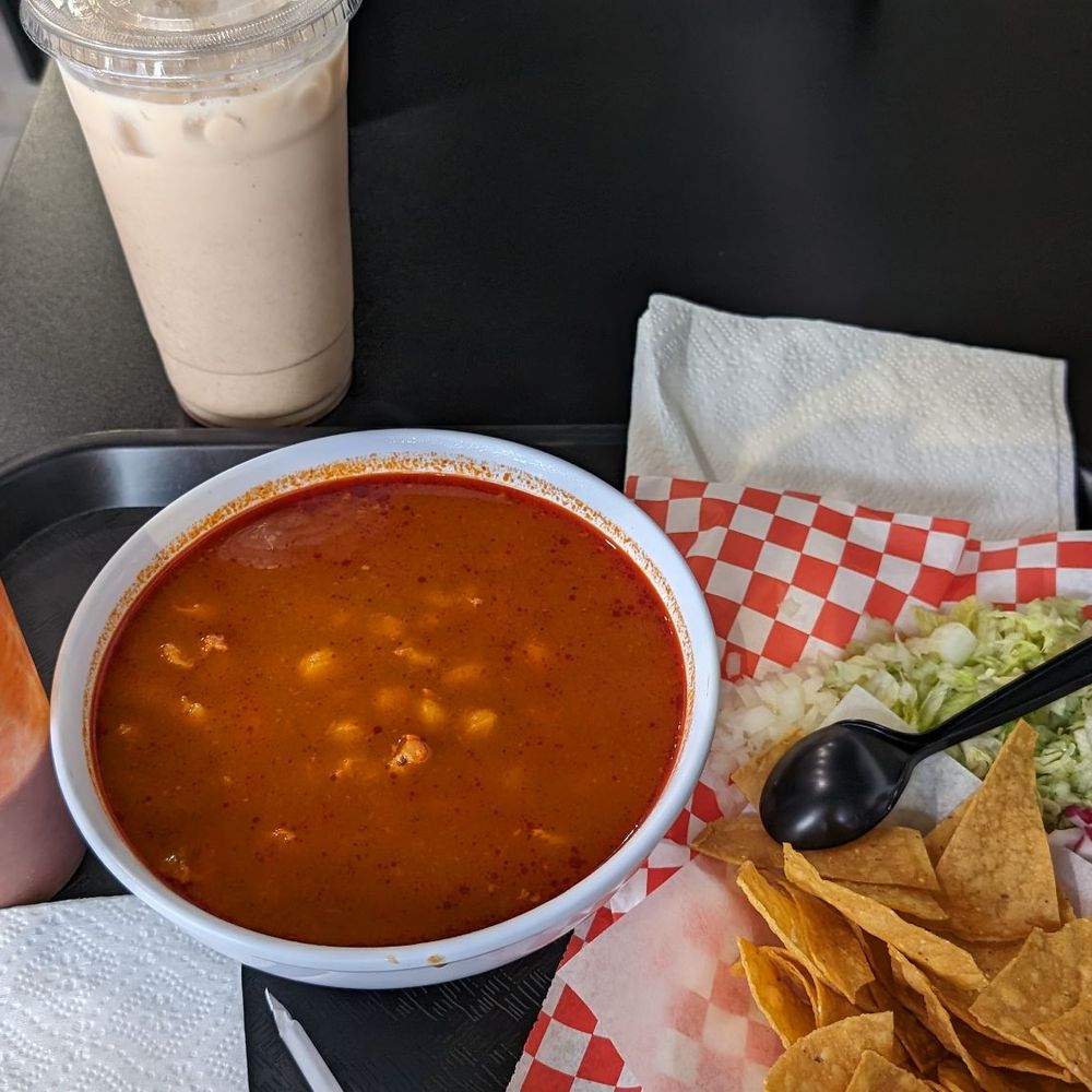 a bowl of soup and tortilla a bowl of soup and tortilla