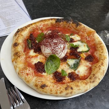 Strega - The Calabrese - SO GOOD! Fresh fior di latte, a whole burrata and 'nduja which is this amazing spicy sausage pate - Wine Bars Near Me - Milford, Connecticut