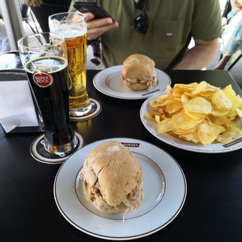 Casa Guedes - Sandes Pernil, chips, preta beer and a Fino beer. Imperial in Lisbon, Fino in Porto, it's the name for a 20cl pilsner style beer - Portuguese Near Me - Porto, 13 Casa Guedes - Sandes Pernil, chips, preta beer and a Fino beer. Imperial in Lisbon, Fino in Porto, it's the name for a 20cl pilsner style beer - Portuguese Near Me - Porto, 13