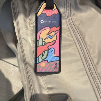 Sapphire Lounge - Complementary luggage tags with a southwestern influence - attached immediately to my Foldie - Airport Lounges Near Me - Phoenix, Arizona