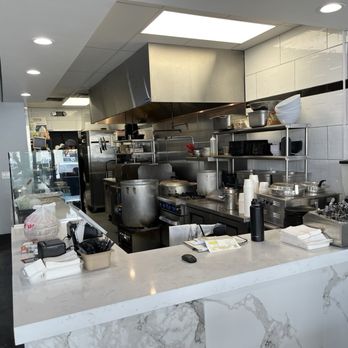 Maxwell Chicken Rice - The kitchen. Only one worker. - Hainan Near Me - La Palma, California Maxwell Chicken Rice - The kitchen. Only one worker. - Hainan Near Me - La Palma, California