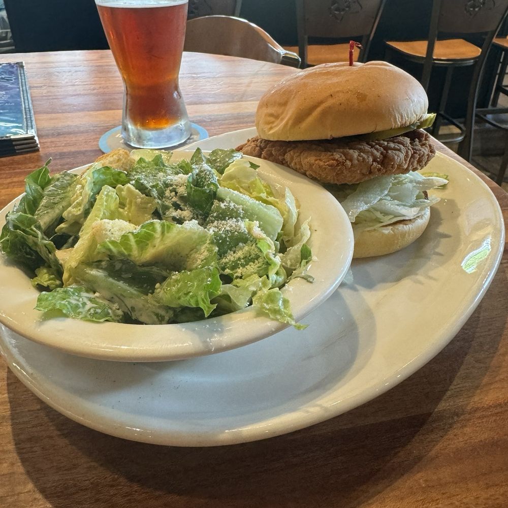 Cesar salad and chicken sandwich. Cesar salad and chicken sandwich.
