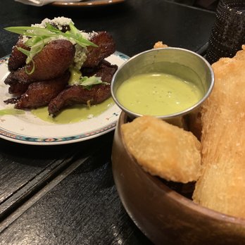 Amaru - Sweet Plantains With Cotija Y Scallions (top), Yuca Frita with Burnt Garlic Aioli (bottom) - Latin American Near Me - Chicago, Illinois
