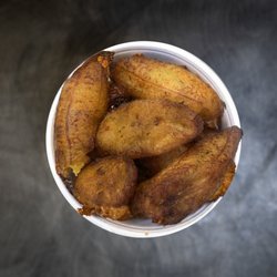 King Pollo - Sweet fried plantains with caramelized edges and a soft, tender center.