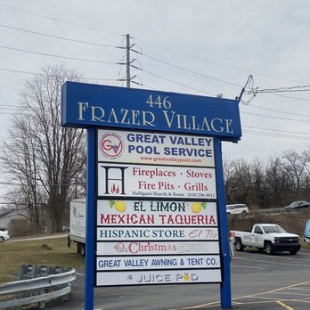 The Juice Pod - a parking lot with a large sign - Juice Bars & Smoothies Near Me - Malvern, Pennsylvania The Juice Pod - a parking lot with a large sign - Juice Bars & Smoothies Near Me - Malvern, Pennsylvania