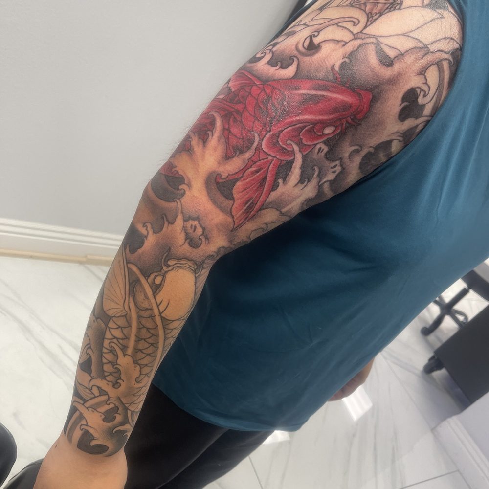 Golden Triangle Art Studio - Line work done and started coloring koi fish - Tattoo Near Me - Upland, California Golden Triangle Art Studio - Line work done and started coloring koi fish - Tattoo Near Me - Upland, California