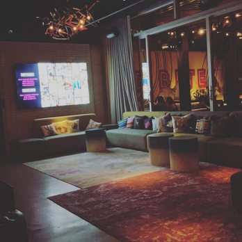 Moxy Austin - University - Lounge area behind the bar - Hotels Near Me - Austin, Texas Moxy Austin - University - Lounge area behind the bar - Hotels Near Me - Austin, Texas