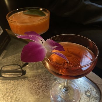Quintana's Speakeasy - 24 KT Magic and a Tsu Baki (riff on a boulevardier using Japanese whiskey and orange bitter infused Campari) - Speakeasies Near Me - Cleveland Heights, Ohio Quintana's Speakeasy - 24 KT Magic and a Tsu Baki (riff on a boulevardier using Japanese whiskey and orange bitter infused Campari) - Speakeasies Near Me - Cleveland Heights, Ohio