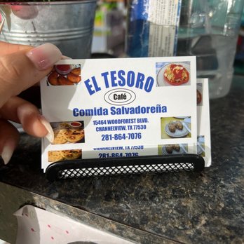 El Tesoro Cafe - a hand holding a business card - Salvadoran Near Me - Channelview, Texas El Tesoro Cafe - a hand holding a business card - Salvadoran Near Me - Channelview, Texas