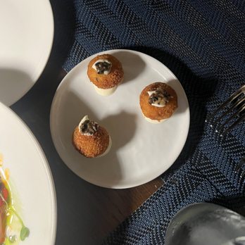 Wicked Butcher - Complimentary risotto balls. 2/5 - Steakhouses Near Me - Dallas, Texas Wicked Butcher - Complimentary risotto balls. 2/5 - Steakhouses Near Me - Dallas, Texas