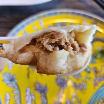 Special Noodle - the bottom of the crispy bread part on the pork bun was too thick (excuse my messy looking bites) - Chinese Near Me - Newark, California Special Noodle - the bottom of the crispy bread part on the pork bun was too thick (excuse my messy looking bites) - Chinese Near Me - Newark, California