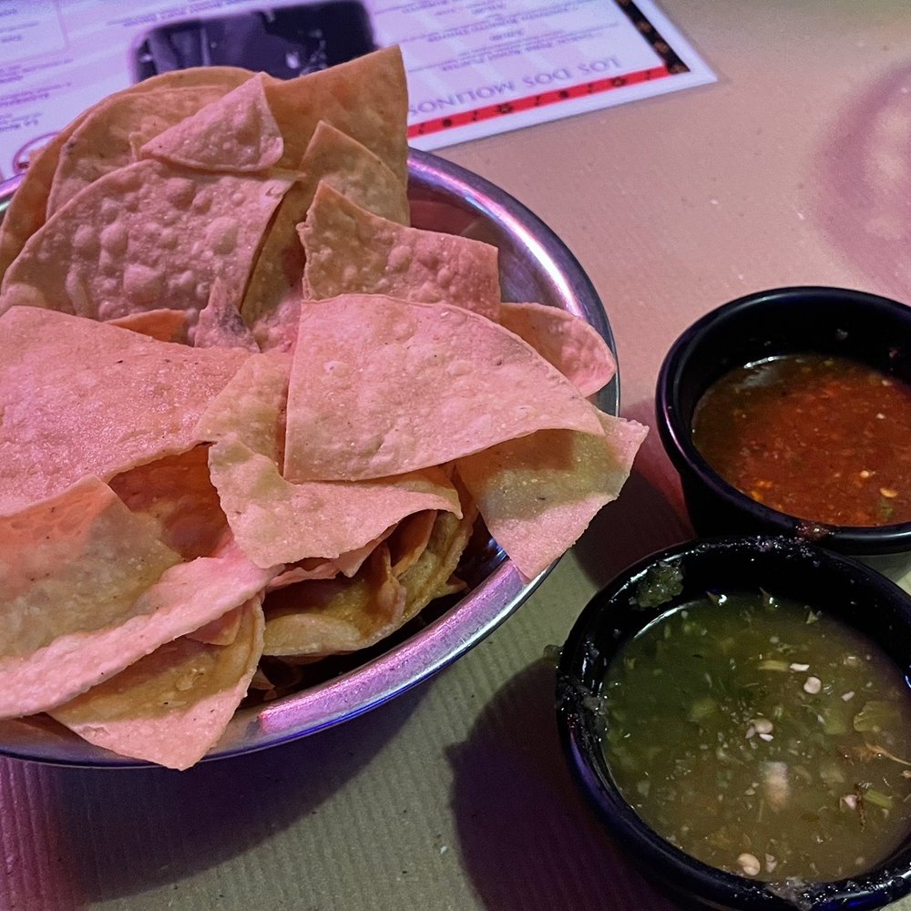 Los Dos Molinos - Complimentary chips and red and green salsa - flaming hot - New Mexican Cuisine Near Me - Phoenix, Arizona Los Dos Molinos - Complimentary chips and red and green salsa - flaming hot - New Mexican Cuisine Near Me - Phoenix, Arizona