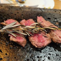 Petit filet on a hot stone.