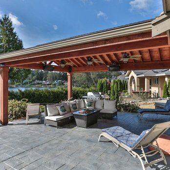 Timberline Patio Covers - Custom Lakewood, WA cedar patio cover with exposed framing, tongue-and-groove ceiling, and durable roofing creates year-round outdoor living - Patio Coverings Near Me - Kent, Washington Timberline Patio Covers - Custom Lakewood, WA cedar patio cover with exposed framing, tongue-and-groove ceiling, and durable roofing creates year-round outdoor living - Patio Coverings Near Me - Kent, Washington