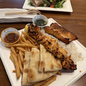 Luna Grill Cerritos - Salmon and chicken plate with rice and fries - Mediterranean Near Me - Cerritos, California