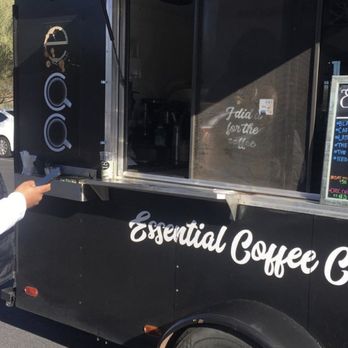 Essential Coffee Cart - a man standing in front of a coffee cart - Coffee & Tea Near Me - Tucson, Arizona