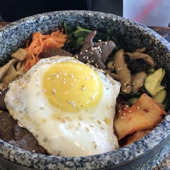 Burning Rice - So delicious! The hot stone bowl keeps the food hot the whole meal - Korean Near Me - Hurst, Texas