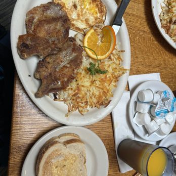 Old Monterey Cafe - 2 over hard eggs with 2 pork chops, hashbrowns and a side of sourdough toast (2 slices) - Breakfast & Brunch Near Me - Monterey, California Old Monterey Cafe - 2 over hard eggs with 2 pork chops, hashbrowns and a side of sourdough toast (2 slices) - Breakfast & Brunch Near Me - Monterey, California