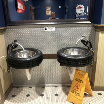 Ford's Garage - Sinks men's room - Burgers Near Me - Brandon, Florida Ford's Garage - Sinks men's room - Burgers Near Me - Brandon, Florida