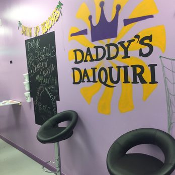 Daddy’s Daiquiris - a purple wall with a crown on it - Cocktail Bars Near Me - Humble, Texas