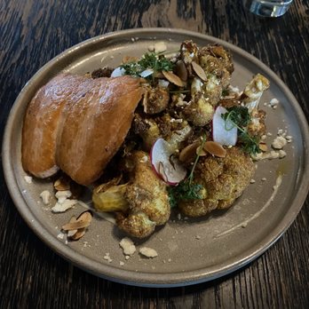 Cala - Roasted cauliflower with added salmon. - Mediterranean Near Me - Scottsdale, Arizona Cala - Roasted cauliflower with added salmon. - Mediterranean Near Me - Scottsdale, Arizona