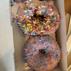 Duck Donuts - Strawberry sprinkle and strawberry cotton candy donuts