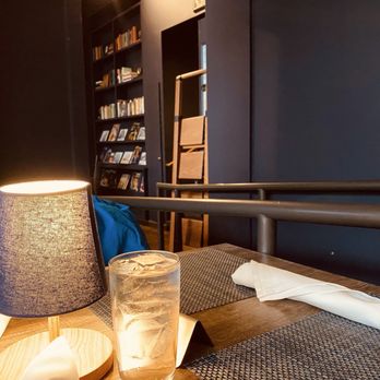 Bookstore Bar & Café - Our nice little table behind the bar. - Fish & Chips Near Me - Seattle, Washington Bookstore Bar & Café - Our nice little table behind the bar. - Fish & Chips Near Me - Seattle, Washington