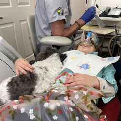 Dowell Alan DDS - Coral is the sweetest little dog and is much comfort for children who have anxiety about going to the dentist.