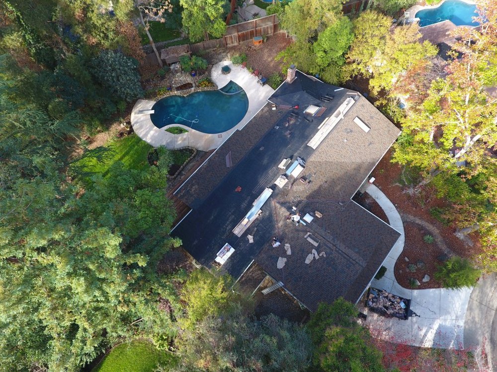 Slide of Signature Roofing