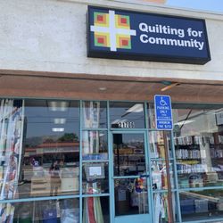 Quilting for Community - Front signage