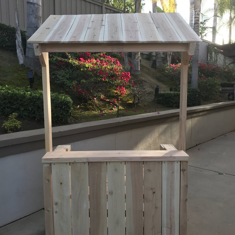 Lowe's Home Improvement - DIY Lemonade Stand (front). The tabletop isn't done here or the paint isn't on but you get the hint. - Home Decor Near Me - Carlsbad, California Lowe's Home Improvement - DIY Lemonade Stand (front). The tabletop isn't done here or the paint isn't on but you get the hint. - Home Decor Near Me - Carlsbad, California