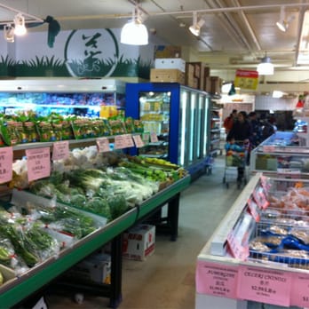 Marché G & D - The produce section abounds with Chinese greens and herbs. - International Grocery Near Me - Montreal, Quebec Marché G & D - The produce section abounds with Chinese greens and herbs. - International Grocery Near Me - Montreal, Quebec