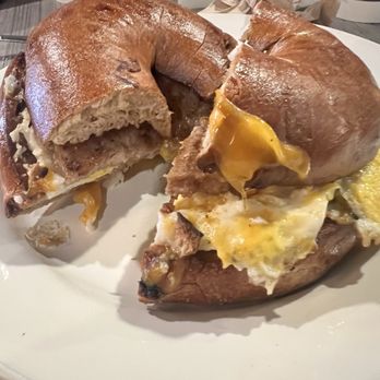 LUMA Cafe & Eatery - Sausage breakfast sandwich with cinnamon bagel - Coffee & Tea Near Me - Niagara Falls, New York LUMA Cafe & Eatery - Sausage breakfast sandwich with cinnamon bagel - Coffee & Tea Near Me - Niagara Falls, New York