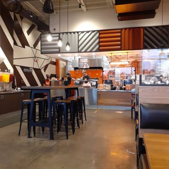 Blaze Pizza - The dining room and the pizza bar. - Pizza Near Me - Murfreesboro, Tennessee