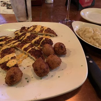 Half Shell Oyster House - Almond crusted chicken. Aahhhhmazing. So were the jalapeño hush puppies and the risotto - Seafood Near Me - Biloxi, Mississippi